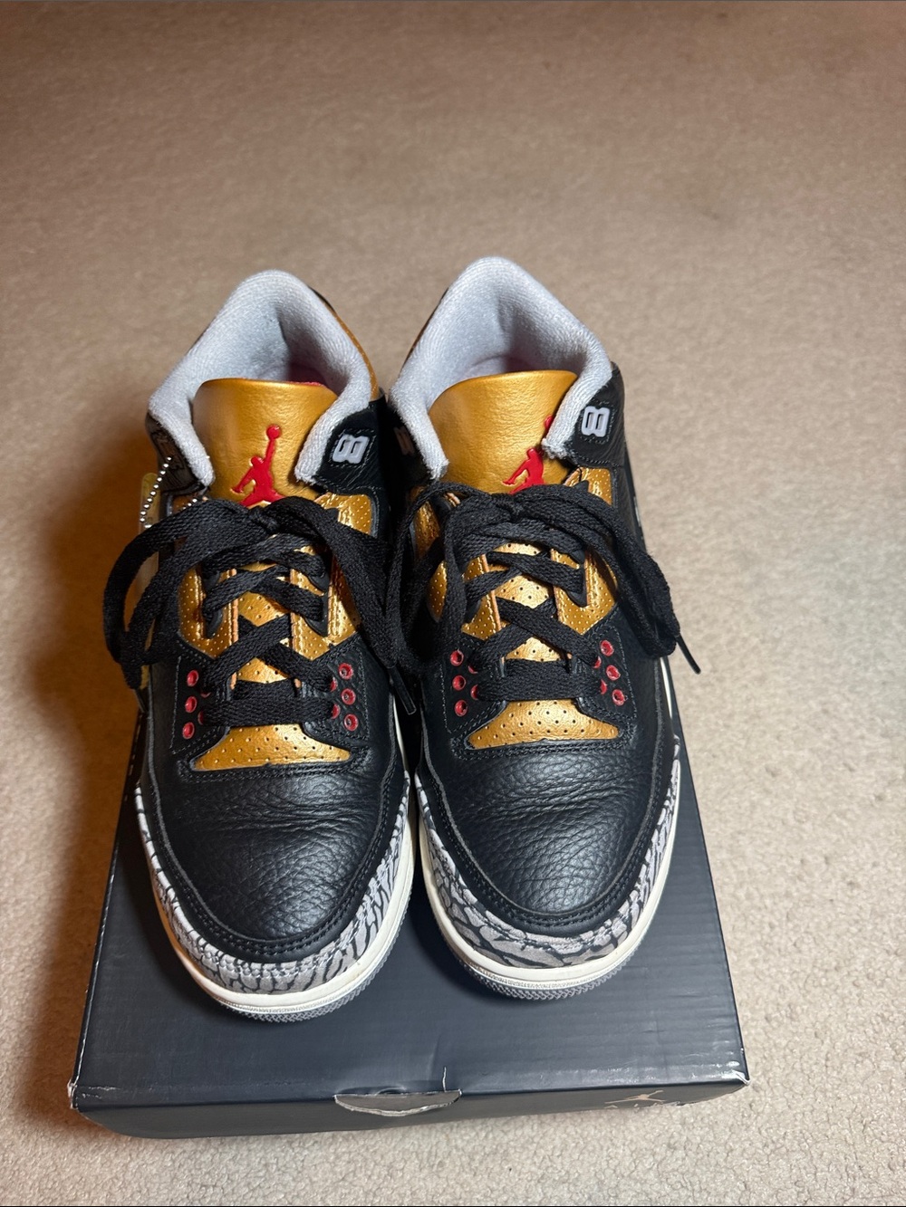 Jordan Black & Metallic Gold Athletic Sneakers with Red Accents